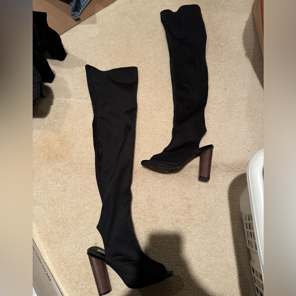 Thigh high black boots